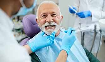 Man smiling in the dental chair