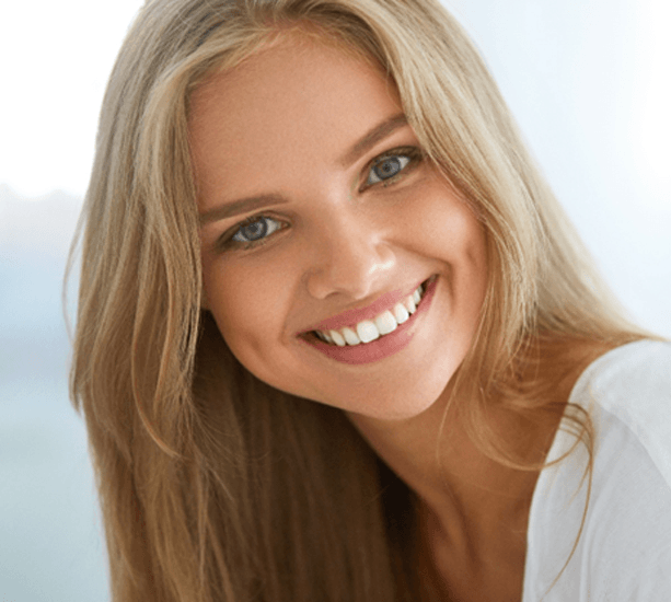 closeup of young woman smiling 